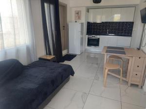 Dapur atau dapur kecil di Thalassa +3 gambar