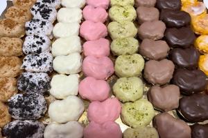 a bunch of different types of donuts on a tray at Casa Rural La Morateña in Morata de Tajuña