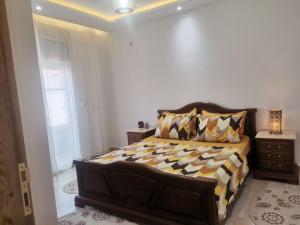 Ένα ή περισσότερα κρεβάτια σε δωμάτιο στο Appartement indépendant de villa