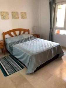 Ένα ή περισσότερα κρεβάτια σε δωμάτιο στο Deux chambres, Orihuela Costa