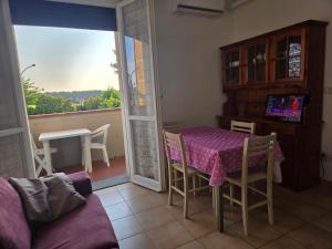 TV a/nebo společenská místnost v ubytování Casa Nanà Beach
