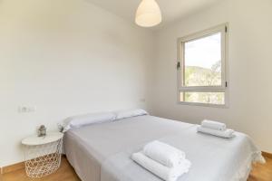 Postel nebo postele na pokoji v ubytování Valle del Este Terraza Piscina Parking Gratis + 12 fotografií