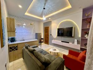 Kuchyň nebo kuchyňský kout v ubytování Sage Apartment