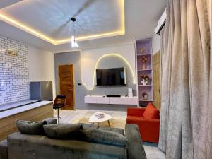 TV a/nebo společenská místnost v ubytování Sage Apartment