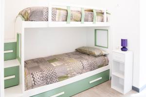 a bedroom with a bunk bed with a bed frame at Agricanto in Sestri Levante +70 photos