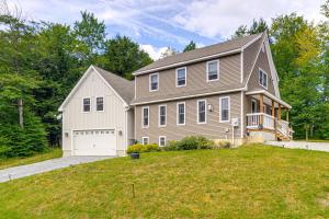 a large house with a garage at Maggie Valley Cabin with Private Hot Tub and Game Room in Maggie Valley