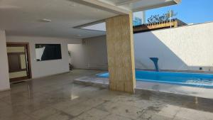 Πισίνα στο ή κοντά στο Casa Temporada Paraíso