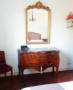 En eller flere senge i et værelse på La Suzanne