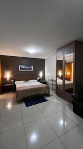 Katil atau katil-katil dalam bilik di Flat Apart Hotel Crystal Place +14 gambar