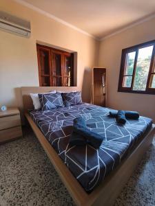 Postel nebo postele na pokoji v ubytování Casa del Kambos