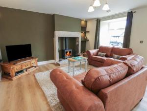 Posezení v ubytování Hollywood cottage