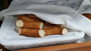 three cigars sitting in a basket on a table at SeaShore Hotel in Istanbul