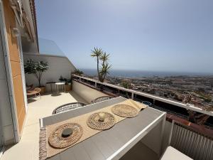 En balkon eller terrasse på Sunset & Ocean Dream Apartment