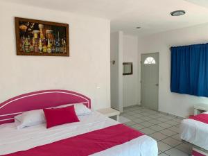 Postel nebo postele na pokoji v ubytování Hotel Real Da Vinci