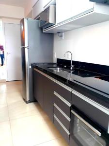 Η κουζίνα ή μικρή κουζίνα στο APOGEO - Apartamento Studio