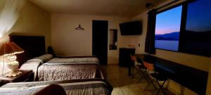Postel nebo postele na pokoji v ubytování Hotel El Eden 4 per 15