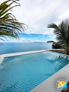 Bazén v ubytování Saraswati Exclusive Resort nebo v jeho okolí