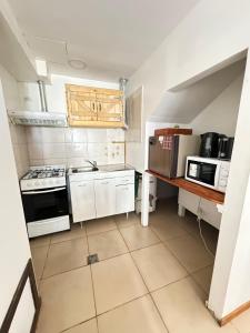 Η κουζίνα ή μικρή κουζίνα στο Apart AlemDuplex