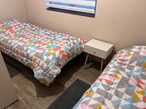 Postel nebo postele na pokoji v ubytování Comfortable departamento en Coronel
