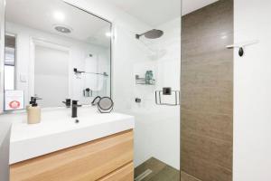 a bathroom with a sink and a shower at 2 Royal Rest Quality 2br West Perth-parking in Perth +15 photos