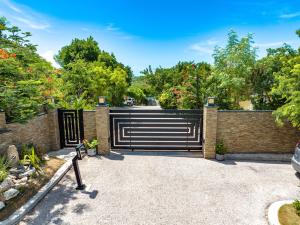 Zahrada ubytování Kokomo Botanical Resort - Caribbean Family Cottages