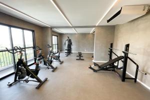 a gym with a bunch of exercise bikes in a room at BSide Faria Lima Pinheiros in Sao Paulo