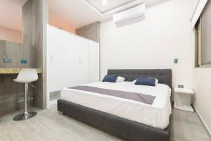 Ένα ή περισσότερα κρεβάτια σε δωμάτιο στο Departamento En El Centro De Playa Del Carmen +18 φωτογραφίες