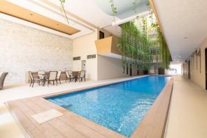 Πισίνα στο ή κοντά στο Departamento En El Centro De Playa Del Carmen