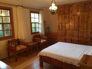 Ένα ή περισσότερα κρεβάτια σε δωμάτιο στο Asur Apart & Villa Asur