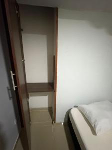 Ένα ή περισσότερα κρεβάτια σε δωμάτιο στο Norte, Habitación 303 +2 φωτογραφίες
