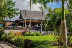 En have udenfor Villa Balinaise dans son écrin tropical