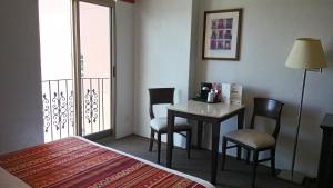 Voodi või voodid majutusasutuse HG Hotel toas