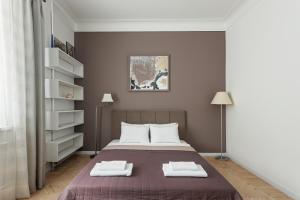 Ένα ή περισσότερα κρεβάτια σε δωμάτιο στο Odesa Black Sea