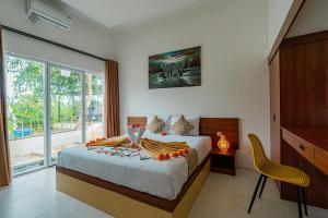 Ένα ή περισσότερα κρεβάτια σε δωμάτιο στο Bella Belly Cottage By Bali Cabin +26 φωτογραφίες