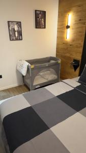 Postel nebo postele na pokoji v ubytování Apartman KOCKICA Entry with PIN 0-24h , Free parking + 40 fotografií