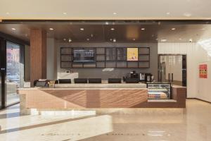 Lobbyen eller receptionen på Hanting Premium Hotel Beijing Lize Business District