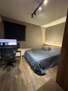 Katil atau katil-katil dalam bilik di Alugo apartamento para COP 30