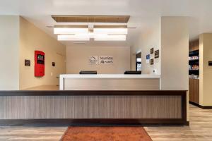 a lobby of a hospital with a waiting room at MainStay Suites Lancaster Dallas South in Lancaster +30 photos