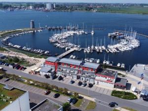 an aerial view of a marina with boats in the water at Am Rundsteg 9 in Burgtiefe auf Fehmarn 