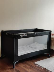 a black playborder bunk bed in a room at Bright through-house triangle in Vilppula