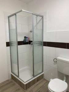Ένα μπάνιο στο Ferienwohnung Meyer Sandhorst