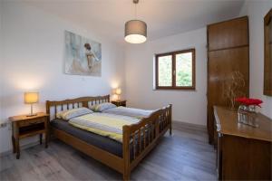 Ένα ή περισσότερα κρεβάτια σε δωμάτιο στο BELA VISTA 5 Appartements Opatija