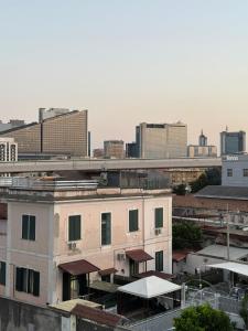 a view of a building with a city in the background at Palazzo SantAntonio Apartament in Naples