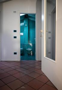 a bathroom with a toilet and a sink at A Casa di Paola in Sirmione