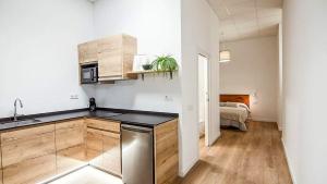 a kitchen with a sink and a counter top at LUXURY APARTMENT SCIENCES CITY Valencia B in Valencia