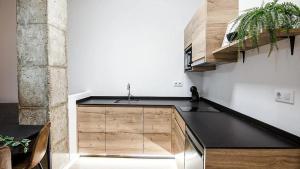 a kitchen with a sink and a counter top at LUXURY APARTMENT SCIENCES CITY Valencia B in Valencia
