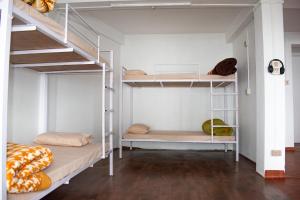 Postel nebo postele na pokoji v ubytování Aavya backpackers hostel + 8 fotografií