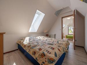 Кровать или кровати в номере La Casa Ferienwohnung Uferschwalbe