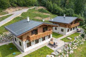 an aerial view of a house with a metal roof at ChaTále - Chalúpky Tále in Tale