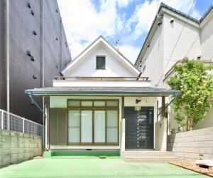 a house with a front door of a building at Kawagoe Inn Tokine - Vacation STAY 38137v in Kawagoe